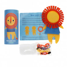 Load image into Gallery viewer, Lion sewing kit with felt pieces, colourful threads, stuffing and illustrated packaging
