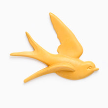 Load image into Gallery viewer, Light orange lucky swallow bird-shaped wall decoration on a white background by anna campbell jones and ocean kitchen scotland
