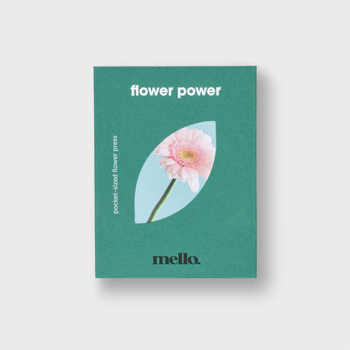Green packaging with a pink flower and 'mello' branding on a light gray background