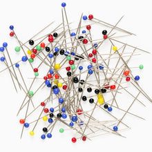 Load image into Gallery viewer, Close-up of sharp steel glass head pins for sewing and dressmaking
