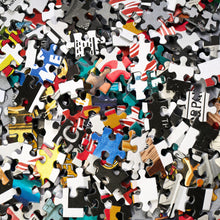 Load image into Gallery viewer, Colourful Movie Cats jigsaw puzzle pieces from the 1000 piece cat-themed puzzle
