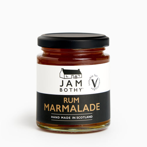 A jar of Gin Bothy Rum Marmalade, hand made in Scotland, with a label showing the brand and product name.