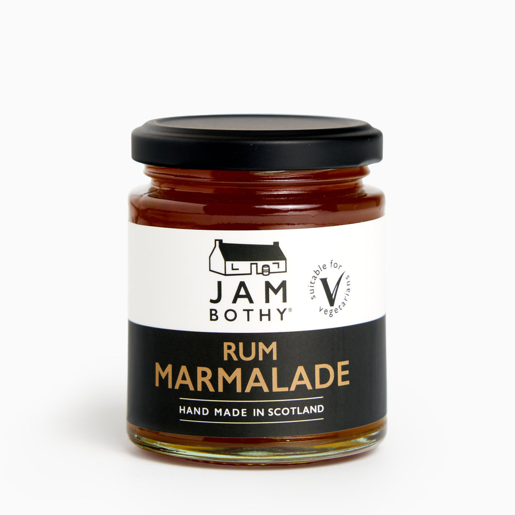 A jar of Gin Bothy Rum Marmalade, hand made in Scotland, with a label showing the brand and product name.