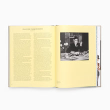 Load image into Gallery viewer, Inside pages of Schiaparelli fashion book showing archival photography and text
