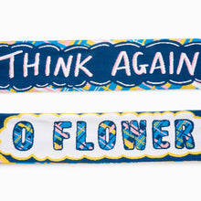Load image into Gallery viewer, Detail of V&amp;A Dundee Scotland world cup football scarf showing “Think Again” and “O Flower” text
