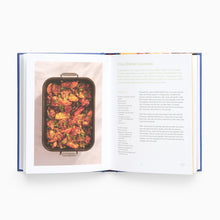 Load image into Gallery viewer, Open cookbook showing a dish of chicken with text on a white background
