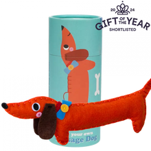 Load image into Gallery viewer, Felt dachshund sew your own kit for kids with a teal cylindrical packaging featuring a dog illustration, on a white background.
