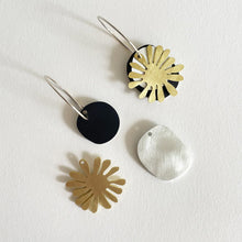 Load image into Gallery viewer, Pair of tom pigeon earrings with floral designs on a white background
