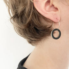 Load image into Gallery viewer, Close-up of a Tom Pigeon earring worn by a person with a neutral background
