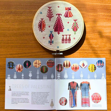 Load image into Gallery viewer, Embroidery hoop with tatreez embroidery pattern of Palestinian trees and instruction manual image
