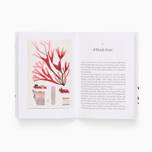 Load image into Gallery viewer, The seaweed collectors handbook  open to a page with red coral illustration and text with a chapter title "A Heady Scent" on a white background
