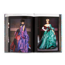 Load image into Gallery viewer, Open Vivienne Westwood Catwalk book showing colourful catwalk looks and iconic British fashion design
